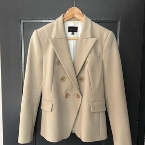 Judith & Charles taupe jacket.